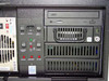 Clarent GC-A032-3 rear control panel close-up showing Reset, Power, PS Reset, Fan/Temp Reset, K-Lock switches and Fan Fail, Overtemp, PS Alarm LEDs with CD-ROM drive above
