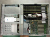 Clarent GC-A032-3 interior top-down view showing card cage with installed DSP and analog port cards, motherboard, and ribbon cabling