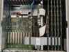 Clarent GC-A032-3 interior close-up showing dual-processor motherboard with Adaptec SCSI controller, ribbon cables, and expansion card backplane
