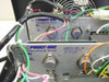 Interior view showing two Power-One HD24-4.8-A International Series 24VDC 4.8A DC converter modules with wiring harness
