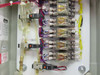 Himel control box interior close-up — lower section showing SMC solenoid valves with tubing and relay rows with numbered terminals