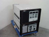 Varian VZC-6965F7 C-Band TWTA RF assembly and power supply stacked on rolling cart — front three-quarter view showing Varian-branded control panels