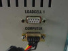 Advanced Imaging Robo4 rear panel close-up showing LOADCELL 1 DB-9 port and COMPUTER DB-9 RS-232 port with wiring