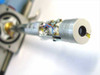 Close-up of detector snout tip showing circular detector window and surrounding metalwork with wiring visible