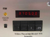 Scientific Atlanta 414 front panel LED frequency display showing 3705.00 MHz with Program Enable indicator and frequency step buttons