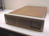 Trimm Industries DA60-D3R external disk drive enclosure — front and top view showing beige plastic front panel and metal chassis