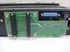 Varian VJW2731A5 – rear panel showing green interface PCB with dual card-edge connectors, DB25 connector (J1), and fuse holder rated 3A/115V and 1.5A/230V