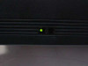 CLI SpectrumSaver front panel close-up showing green power indicator LED and navigation buttons