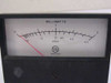 Varian analog panel meter close-up of dial face showing MILLIWATTS 0-2 scale, -10 to +3 dBm secondary scale, and Varian logo