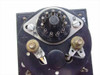 Varian 110641 wattmeter rear close-up showing circular multi-pin terminal block with labeled connection points and two brass terminal posts