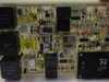 Tellabs 6923 circuit board interior — wider top view showing relays, capacitors, ICs, and TN transformer module 37-0001