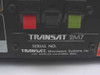 Transat 2M7 Satellite Receiver — rear label close-up showing TRANSAT 2M7 model designation, serial number plate, and Transat Microwave Systems Inc., Los Angeles California 90021 manufacturer identification