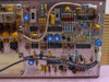 Scientific Atlanta 7550 Baseband Processor ASSY 262195 – close-up PCB view showing integrated circuits, blue capacitors, and board silkscreen markings