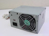 Compaq PS2014 270656-001 200W ATX power supply – rear view showing IEC AC inlet, power switch, and 80mm cooling fan
