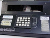 Conner Moon Lander II front panel showing hex keypad, ESC/SPC/DEL/ENTER keys, FilePro III label, and Applied Magnetics calibration stickers