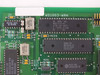 Close-up of WD1003-WAH PCB showing WDC WD1015-PL ROM chip, WD2010B-PL controller chip, and crystal oscillators near board edge