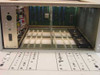 Fairchild SM220 interior chassis view showing card cage with backplane PCB, internal wiring, and power supply section