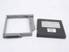 Toshiba PA2451U case and PA2492U Li-Ion battery cell separated — grey plastic outer frame on left, black battery module on right