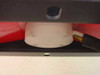 Thomson TH2485B klystron tube – underside view showing cylindrical base of klystron tube body with wiring harness (red and yellow leads) exiting toward chassis