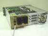 Scientific Atlanta 7500 Video Receiver — rear/side view showing black heatsink, internal card assemblies, and rear panel connectors