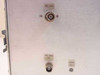 3dbm 70FMO side panel — RF OUT BNC connector (top), FM Mod In BNC connector (bottom), and Freq Adj trim