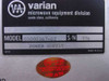 Varian Microwave Equipment Division rating plate closeup showing Model 01000167-02, S/N 776, Power Supply, Made in U.S.A., with Varian inspection sticker