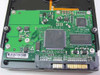 Seagate ST3200827AS PCB underside showing STMicroelectronics V486AB controller chip and Samsung memory IC