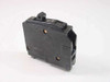 Square D KU-197 Type QO 1-Pole 20 Amp Circuit Breaker – left side profile view showing toggle switch and mounting clip