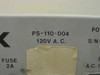 Avantek PS-110-004 label closeup showing model number PS-110-004, 120V A.C. input rating, and 2A fuse designation on panel face