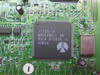 Close-up of Rockwell 11235-14 main controller chip on V1456VQH-R3 PCI modem card