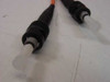 Detail view of ST duplex connectors on Siecor OFNR fiber optic cable showing ferrule tips and knurled coupling nuts
