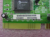 Davicom DM6382F chip close-up on 3334BDV modem card with barcode label showing model 3334BDV and serial 980502582