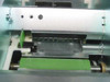 Close-up of thermal printhead assembly and card feed rollers inside the Evolis Pebble 2 Kiosk printer