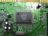 Close-up of OPTi 82C931 audio chipset IC showing markings: OPTi 82C931, date code 119707, batch code 11CW
