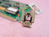RJ11 connector attached to Velan APS Rev C modem card via wire harness