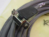 FSI 908152-050 Rev B Polaris cable close-up of DB15 female D-sub connector end with metal shell