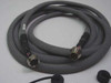 FSI D231229000 cable laid flat showing both multi-pin circular connector ends and gray braided jacket