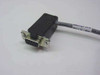 FSI 907953-005 debug cable – close-up of female DB9 connector end with label reading Emulation