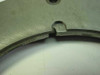 Close-up of the rotation stop slot and detent mechanism on the inner ring interface