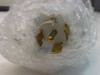 IVS Accuvision 200 – close-up of twist-lock power plug face showing brass contacts, bubble-wrapped for protection