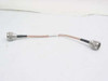 ESM Cable Corp RG-142 10-inch coaxial cable with N-Male and N-Female connectors shown full length on white background