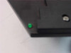 Close-up of green LED status indicator on corner of 6-Position Logic Driven Pedestal Cassette Tray platform