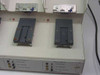 Elite Engineering Electrode Test Station — top view of Stations 4 and 5 with lids open showing electrode fixtures; Station 5 label reads Elite Engineering Corp