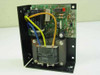 Elexon SOLV15-24 power supply module – interior view showing PCB, transformer with 115V/230V tap wiring, blue and yellow lead wires