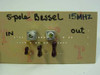 5-pole Bessel 15 MHz low pass filter card — close-up top view showing SMA connectors, ceramic capacitors, and hand-inked IN/OUT markings
