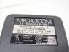 Microcom 13-0000022-001 label closeup showing Class 2 transformer specs: IN AC 120V 60Hz 35W, OUT AC 19.5V 0.8A, UL Listed, Taiwan R.O.C.