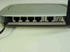 Netgear WGT624 – rear panel showing 4 LAN RJ-45 ports, 1 WAN port, reset button, and DC power jack