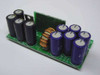 IBM 01K7371 VRM — reverse side view showing large electrolytic capacitors and toroidal inductor coil on green PCB
