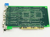 Neotech S2M100 Dual RS-232 MCA Serial Card – solder side showing PCB traces, MCA edge connector, and two DB-9 port bracket