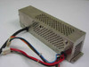 PGC PGC-50-K AT slim power supply – left-side view showing perforated top panel, mounting feet, and output cable bundle
